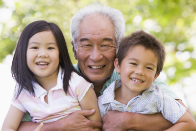 a grandpa with two grandchildren